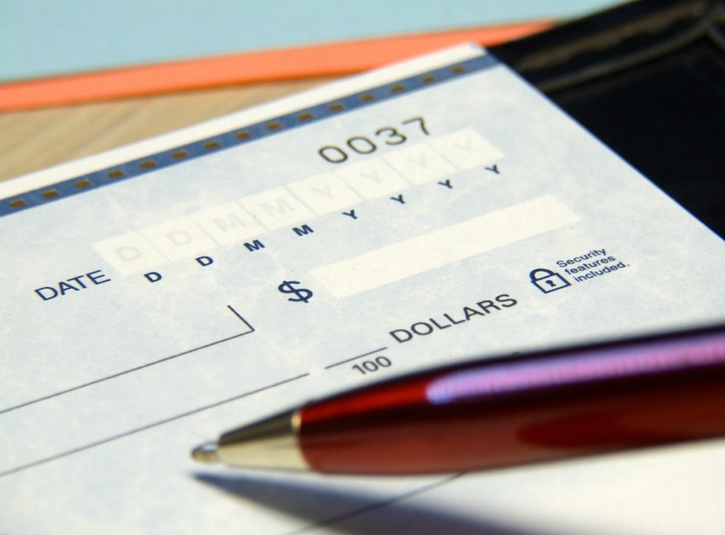 Writing A Check For A Home Deposit